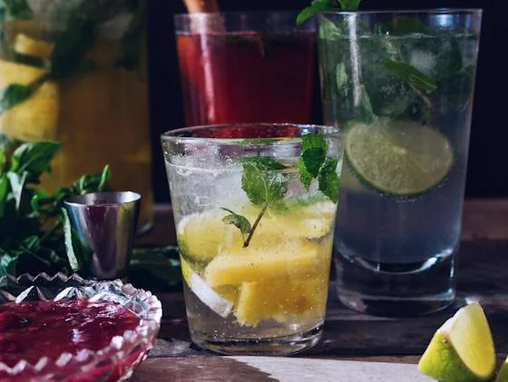 Colorful summer cocktails with fresh fruit and mint