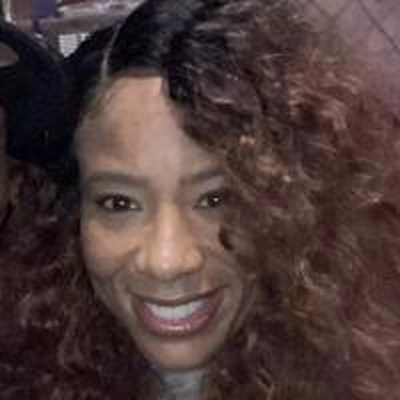 Portrait of Ms. Jones, resident event host specializing in bingo, karaoke, game nights, workshops, and interactive entertainment for apartment communities.