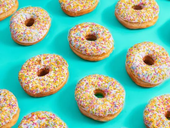 Colorful sprinkle donuts arranged for National Donut Day