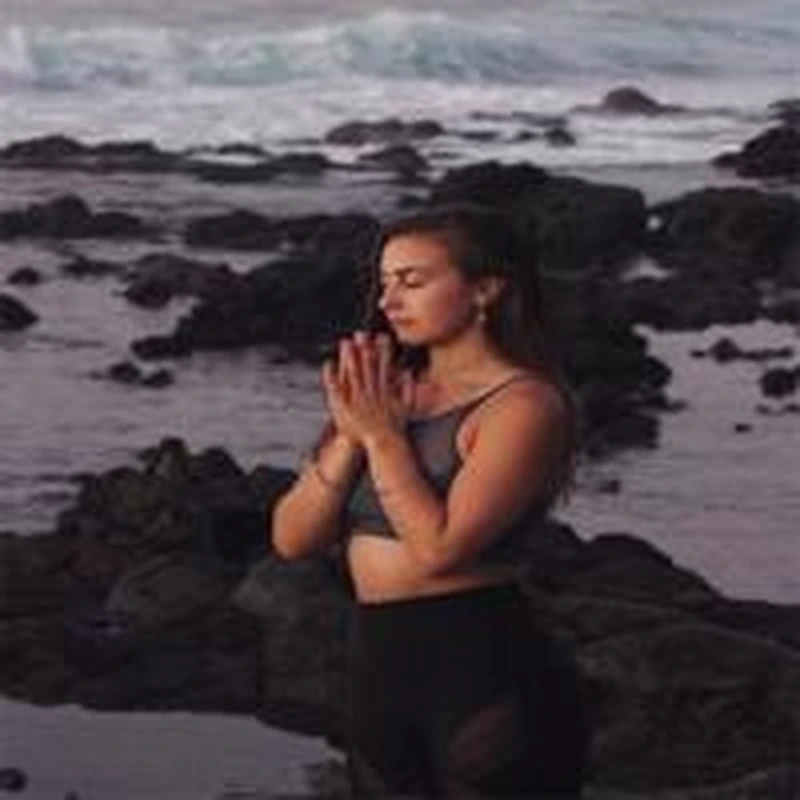 Portrait of Nikki Symanovich, yoga and Mindbody instructor leading wellness classes for apartment community resident events.