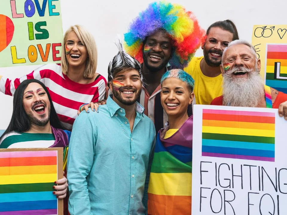 Group celebrating Pride together at a colorful community event