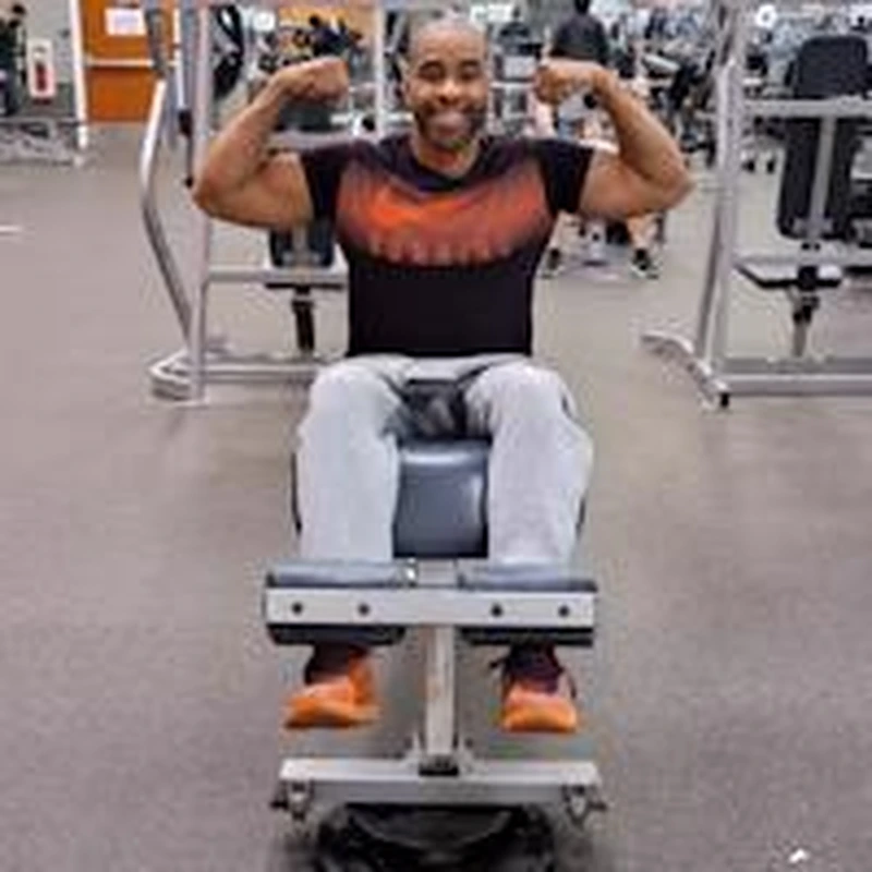 Portrait of Thelonious Scott, fitness and wellness coach leading group fitness classes and wellness events for apartment communities.