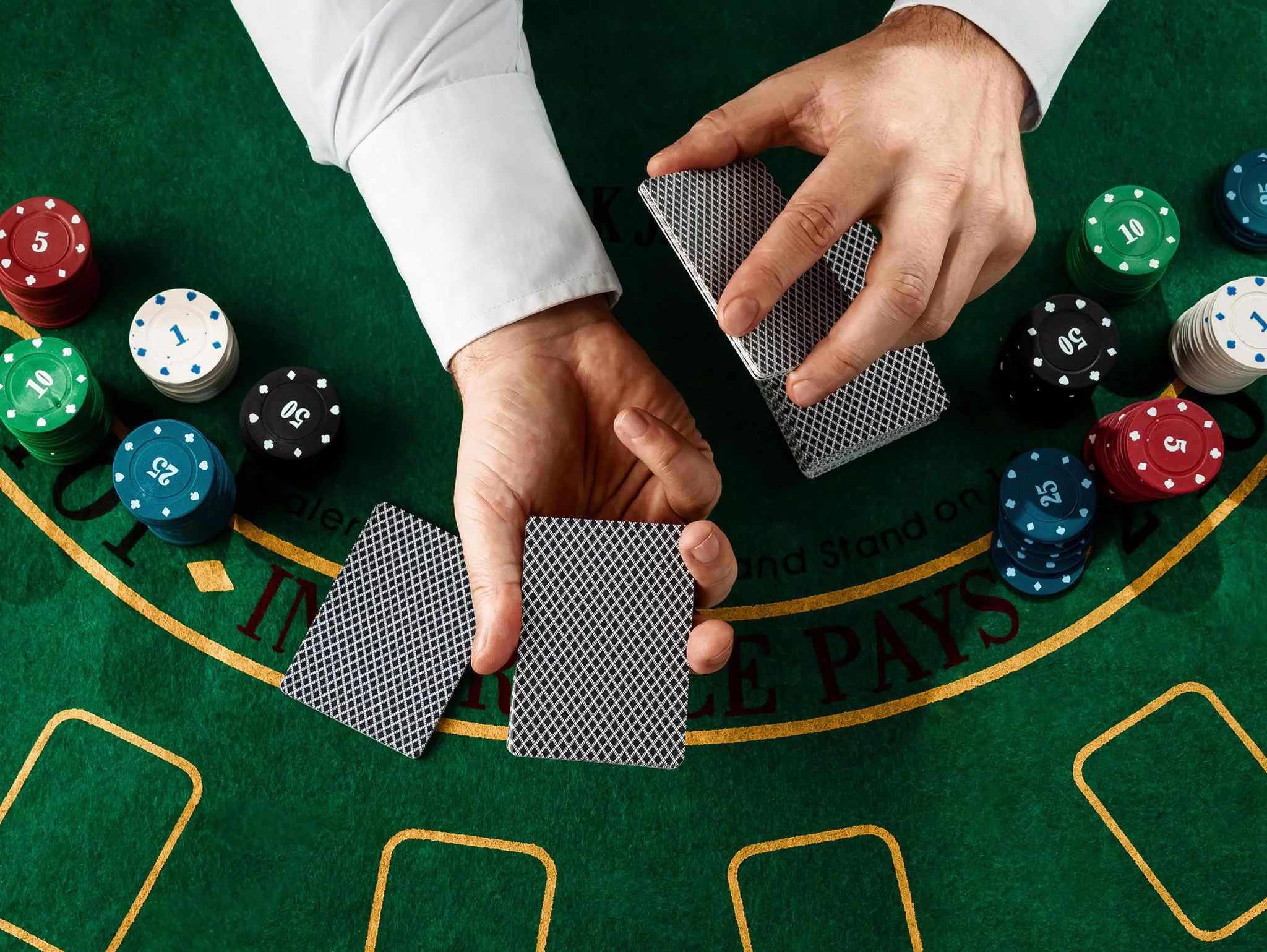 Playing cards and poker chips on a casino table