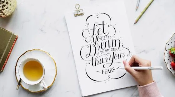 Calligraphy lettering created during a resident workshop