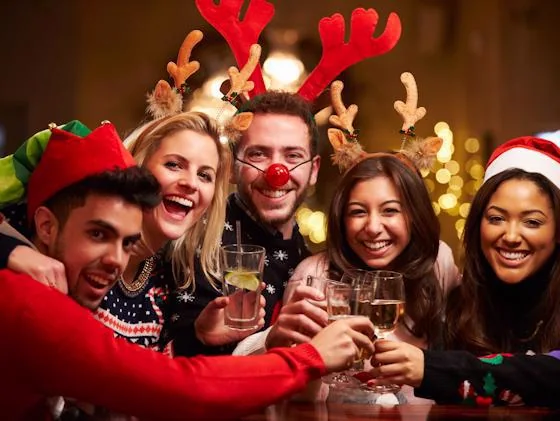 Residents celebrating together at a festive Christmas holiday party