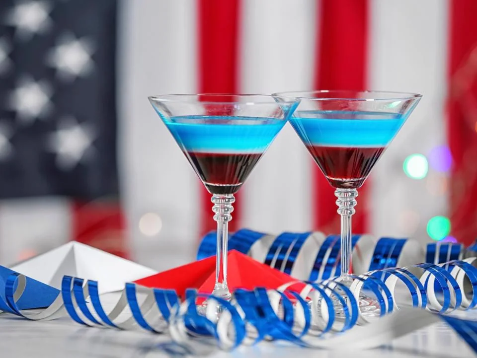 Red white and blue layered cocktails for a Fourth of July celebration
