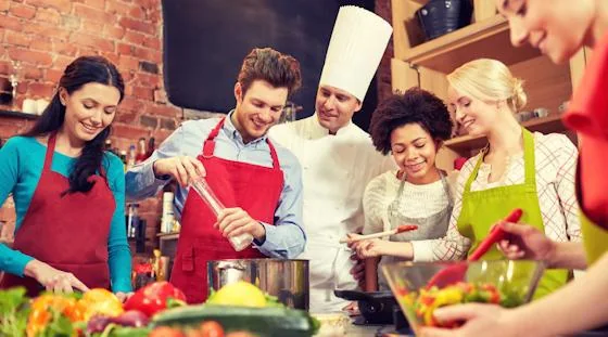 Group preparing fresh ingredients during a healthy cooking class