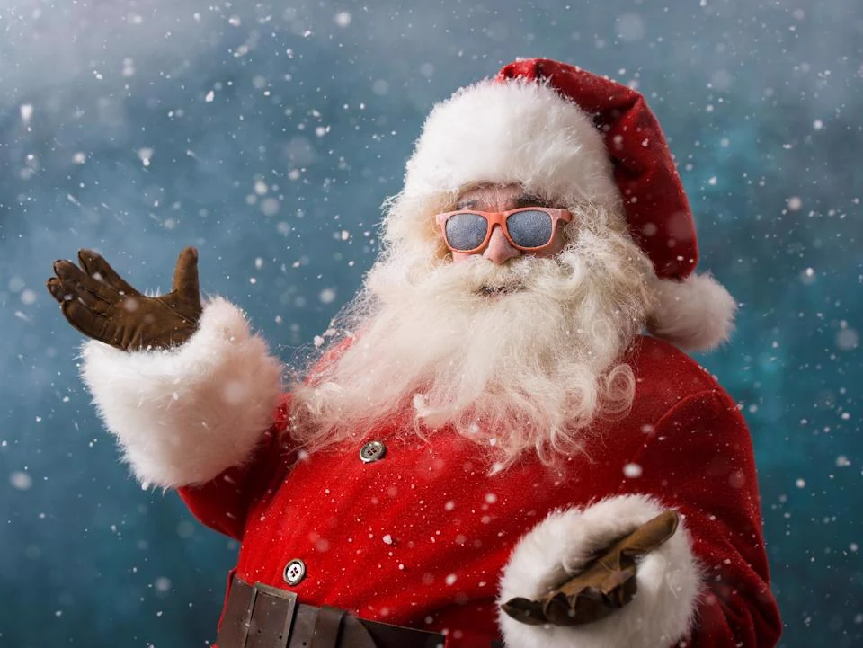 Santa meeting and greeting residents at a holiday community event