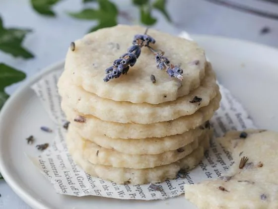 Stack of homemade shortbread cookies decorated with lavender