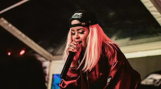 Vocalist performing live at an evening lounge event