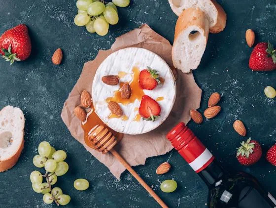 Wine and cheese arranged for a resident tasting event