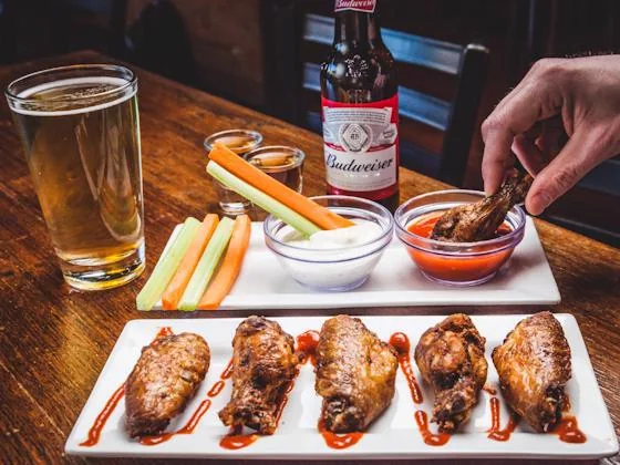 Wing Fest for apartment community residents with chicken wings and dipping sauces